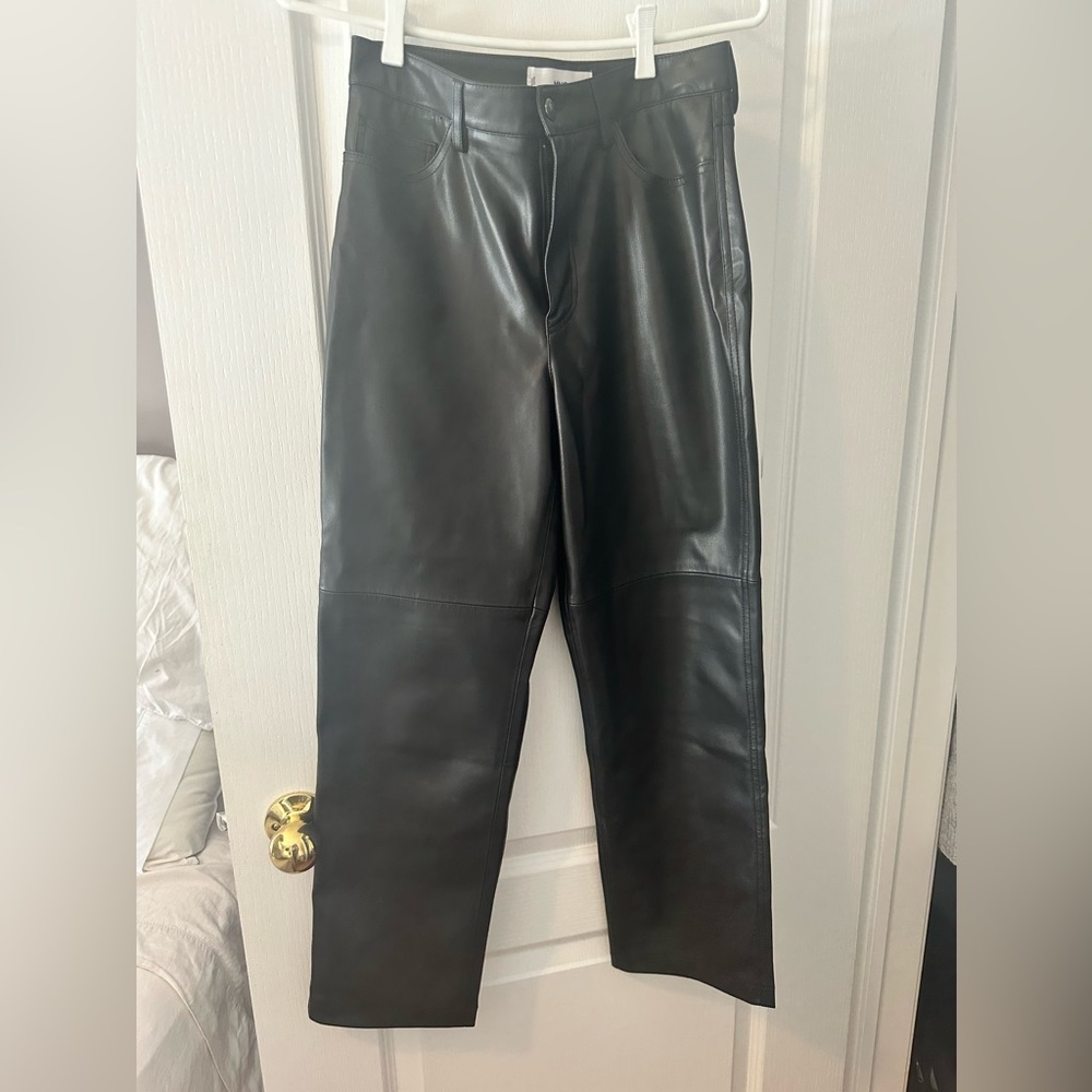 Black faux leather pants from Mango
